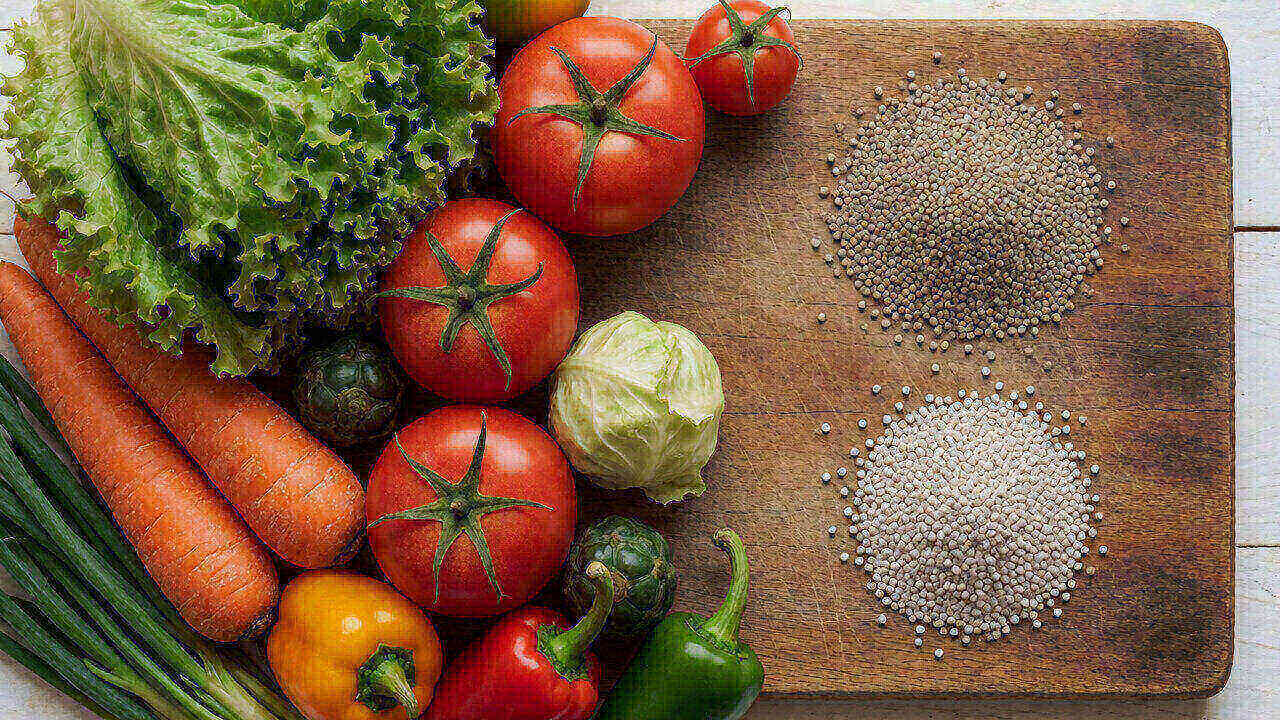 NPK ratio chart for vegetable crops grouped by family with planting and side-dress columns